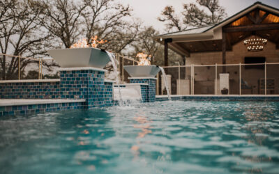 How Lighting and Landscaping Elevate a Pool from Basic to Breathtaking